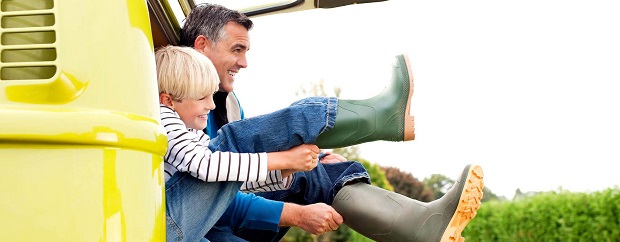 Father_and_son_putting_on_boots